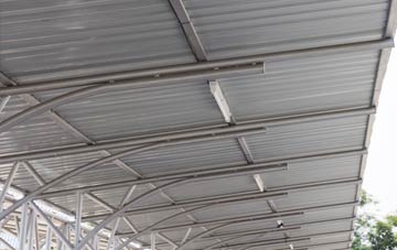 installing Dizzard metal roofing